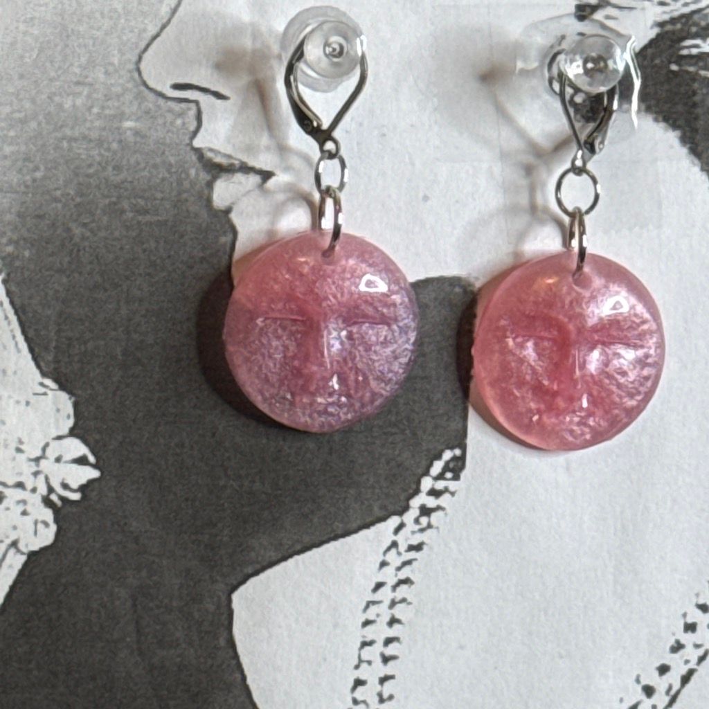 Whimsical pink moonface earrings