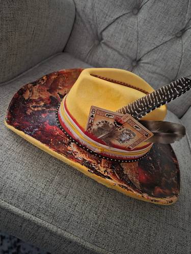 A Cowboy Hat with a Story- made for someone who rides to their own beat.